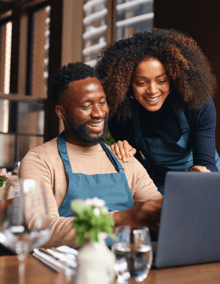 Business owners reviewing their follow-up system